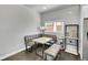 Cozy dining area with banquette seating, a stylish table, and a modern bar setup, perfect for intimate meals at 7035 E 38Th Ave # 4, Denver, CO 80207