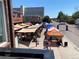 Brewing company hosts outdoor market with canopies, seating, and a finish line arch nearby at 7035 E 38Th Ave # 4, Denver, CO 80207
