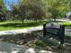 Martin Luther King, Jr. Park sign surrounded by landscaping and shade trees at 7035 E 38Th Ave # 4, Denver, CO 80207
