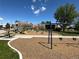 Community playground with swings, slides, and climbing structures for children to enjoy at 7035 E 38Th Ave # 4, Denver, CO 80207