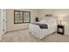 Cozy bedroom with soft lighting, a large window and light coloured decor at 70 Long Bow Cir, Monument, CO 80132