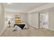 Bright bedroom features neutral walls, carpet, and a comfortable bed with stylish decor at 70 Long Bow Cir, Monument, CO 80132