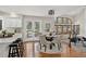 Cozy dining area with wood floors and a door to the deck and adjoins the adjacent living area at 70 Long Bow Cir, Monument, CO 80132