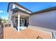 Spacious back deck with modern railings and string lights, perfect for entertaining at 6632 Osage St, Denver, CO 80221