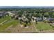 An aerial view of the property showcasing the spacious lot, landscaping, and neighborhood at 14652 Kalamath Ct, Westminster, CO 80023