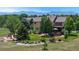 Enjoy picturesque mountain views from this property's expansive backyard with mature trees, lawn and play area at 14652 Kalamath Ct, Westminster, CO 80023
