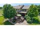 A serene backyard features a spacious deck, complete with a dining area for enjoying outdoor meals at 14652 Kalamath Ct, Westminster, CO 80023