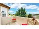 Balcony with scenic views, featuring chairs with red cushions at 14652 Kalamath Ct, Westminster, CO 80023
