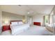 Spacious bedroom featuring neutral carpets, a ceiling fan and natural light at 14652 Kalamath Ct, Westminster, CO 80023