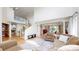 Open-concept living room with hardwood floors, featuring a view of the staircase and dining room at 14652 Kalamath Ct, Westminster, CO 80023