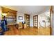 Cozy home office featuring built-in shelving and hardwood floors at 14652 Kalamath Ct, Westminster, CO 80023