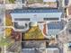 An overhead aerial view of a home displaying the backyard layout, privacy fence, and solar panels at 2244 S Franklin St, Denver, CO 80210