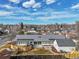 An aerial view of home with solar panels, modern design, and landscaped yard in quiet neighborhood at 2244 S Franklin St, Denver, CO 80210