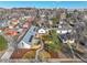 An aerial view of a charming single-Gathering home featuring a new fence, solar panels, and landscaping at 2244 S Franklin St, Denver, CO 80210