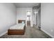 Cozy bedroom with neutral tones, carpet, and access to an ensuite bathroom at 6018 Beeler Ct, Denver, CO 80238