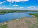 An aerial view of the lake shows the community's waterfront location with stunning water views at 4704 W Hinsdale Ct, Littleton, CO 80128