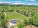 An aerial view displays a park and playground in the community, perfect for families at 4704 W Hinsdale Ct, Littleton, CO 80128