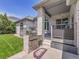 The backyard includes an outdoor grill and patio area, great for hosting barbecues at 4704 W Hinsdale Ct, Littleton, CO 80128