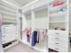 Well-organized walk-in closet with ample shelving and hanging space at 4704 W Hinsdale Ct, Littleton, CO 80128