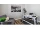Cozy home office featuring a modern desk, comfortable chair, and stylish decor at 15131 Munich Ave, Parker, CO 80134