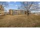 Spacious lawn area in front of a building, offering green space and a neighborhood view at 665 S Alton Way # 4B, Denver, CO 80247