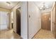 Hallway leading into kitchen and bedroom areas at 665 S Alton Way # 4B, Denver, CO 80247