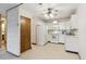 A fully equipped kitchen with an adjoining doorway at 665 S Alton Way # 4B, Denver, CO 80247