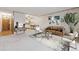 Inviting living room with a modern kitchen view and stylish decor at 665 S Alton Way # 4B, Denver, CO 80247