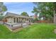 Expansive backyard with a spacious deck, perfect for outdoor entertaining and relaxation at 8116 W Fremont Dr, Littleton, CO 80128