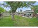 Large backyard with mature trees, shed, patio area and outdoor seating create a wonderful place to relax at 8116 W Fremont Dr, Littleton, CO 80128