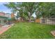 Lush backyard with large, mature tree provides ample shade, privacy, and outdoor enjoyment at 8116 W Fremont Dr, Littleton, CO 80128