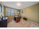 Bright office space with a desk, natural light, and neutral paint at 8116 W Fremont Dr, Littleton, CO 80128