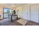 Bright dining area with a modern table set, sliding glass doors, and seamless access to the adjacent living spaces at 5995 W Hampden Ave # 17F, Denver, CO 80227