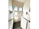 Entryway features bead board walls and access to outside at 267 S 3Rd Ave, Brighton, CO 80601