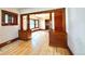 Hardwood floors and detailed wood trim in a well-lit living room at 267 S 3Rd Ave, Brighton, CO 80601