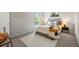 Cozy bedroom with carpet, a queen bed, and stylish decor at 1250 S Monaco Pkwy # 50, Denver, CO 80224