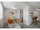 Open concept dining area featuring modern lighting and stylish decor at 1250 S Monaco Pkwy # 50, Denver, CO 80224