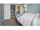 Inviting bedroom with closet, ample floorspace and doorway to an adjacent room at 2427 Cherry Cir, Brighton, CO 80601