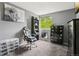 This bedroom includes a window, computer desk, computer chair, and a cabinet at 2427 Cherry Cir, Brighton, CO 80601