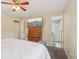 Spacious main bedroom with ensuite bathroom and a large-screen TV at 2427 Cherry Cir, Brighton, CO 80601