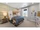 Fun bedroom with car bed frame, plaid wallpaper, large window with natural light, and neutral carpet at 4334 Ridgewalk Pt, Castle Rock, CO 80108