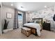 Stylized bedroom featuring a bed, window, and unique wallpaper, creating a trendy and comfortable space at 4334 Ridgewalk Pt, Castle Rock, CO 80108