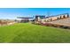 Community green space with clubhouse, workout area, and landscaping at 4334 Ridgewalk Pt, Castle Rock, CO 80108