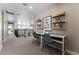 Hallway featuring study desks and shelves, offering a functional space for learning or hobbies at 4334 Ridgewalk Pt, Castle Rock, CO 80108
