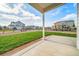 Backyard and patio area with view of neighboring houses at 42400 Forest Oaks Dr, Elizabeth, CO 80107