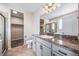 Stylish bathroom features granite countertops, modern fixtures, and separate toilet and shower area at 42400 Forest Oaks Dr, Elizabeth, CO 80107