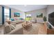 Cozy living room featuring comfortable seating, natural light, and elegant decor at 42400 Forest Oaks Dr, Elizabeth, CO 80107