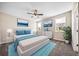 Bright bedroom with ample natural light, ceiling fan, and tasteful décor for a serene retreat at 42400 Forest Oaks Dr, Elizabeth, CO 80107