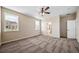 Large main bedroom with bright windows and an ensuite bathroom and walk-in closet at 42400 Forest Oaks Dr, Elizabeth, CO 80107