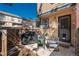 Cozy back patio with an outdoor seating area, ideal for relaxing or entertaining guests at 2927 W 81St Ave # H, Westminster, CO 80031